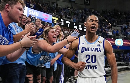 Indiana State Sycamores guard Jayson Kent (20) yells in excitement with fans Wednesday, March 20, 2024, after defeating Southern Methodist Mustangs in the first round of the NIT at the Hulman Center in Terre Haute. The Indiana State Sycamores defeated the Southern Methodist Mustangs, 101-92.