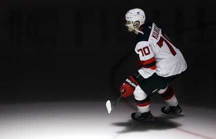 Mar 21, 2021; Pittsburgh, Pennsylvania, USA;  New Jersey Devils defenseman Dmitry Kulikov (70) takes the ice to play the Pittsburgh Penguins at PPG Paints Arena. New Jersey won 2-1 in overtime. Mandatory Credit: Charles LeClaire-USA TODAY Sports