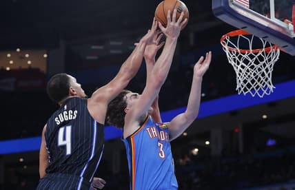 Nov 1, 2022; Oklahoma City, Oklahoma, USA; Oklahoma City Thunder guard Josh Giddey (3) goes to the basket as Orlando Magic guard Jalen Suggs (4) defends during the second half at Paycom Center. Oklahoma City won 116-108. Mandatory Credit: Alonzo Adams-USA TODAY Sports