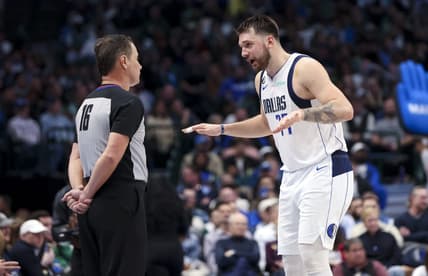 Dec 12, 2022; Dallas, Texas, USA; Dallas Mavericks guard Luka Doncic (77) speaks with referee David Guthrie (16) during the second half against the Oklahoma City Thunder at American Airlines Center. Mandatory Credit: Kevin Jairaj-USA TODAY Sports