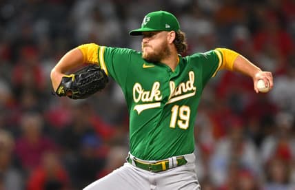 Sep 29, 2022; Anaheim, California, USA;  Oakland Athletics starting pitcher Cole Irvin (19) throws to the plate in the third inning against the Los Angeles Angels at Angel Stadium. Mandatory Credit: Jayne Kamin-Oncea-USA TODAY Sports