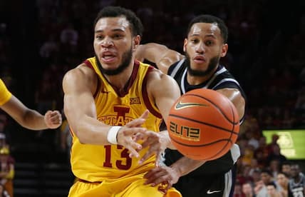 Iowa State University Cyclones guard Jaren Holmes (13) and Kansas State Wildcats guard Markquis Nowell (1) battle for the ball during the second half at Hilton Coliseum Tuesday, 2023, in Ames, Iowa.

Kansas State And Iowa State Men S Basketball