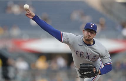 May 22, 2023; Pittsburgh, Pennsylvania, USA;  Texas Rangers starting pitcher Dane Dunning (33) pitches against the Pittsburgh Pirates during the fifth inning at PNC Park. Mandatory Credit: Charles LeClaire-USA TODAY Sports