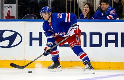 Jan 2, 2024; New York, New York, USA; New York Rangers center Jonny Brodzinski (22) looks to pass against the Carolina Hurricanes during the third period at Madison Square Garden. Mandatory Credit: Danny Wild-USA TODAY Sports