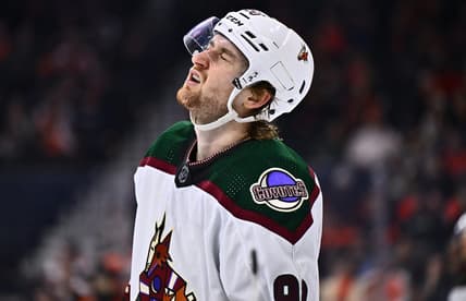 Feb 12, 2024; Philadelphia, Pennsylvania, USA; Arizona Coyotes defenseman J.J. Moser (90) reacts against the Philadelphia Flyers in the third period at Wells Fargo Center. Mandatory Credit: Kyle Ross-USA TODAY Sports
