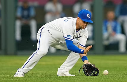 Jul 25, 2022; Kansas City, Missouri, USA; Kansas City Royals second baseman Whit Merrifield (15) fields a ground ball during the first inning against the Los Angeles Angels at Kauffman Stadium. Mandatory Credit: Jay Biggerstaff-USA TODAY Sports