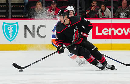 Nov 30, 2023; Raleigh, North Carolina, USA; Carolina Hurricanes center Martin Necas (88) skates against the New York Islanders during the overtime at PNC Arena. Mandatory Credit: James Guillory-USA TODAY Sports