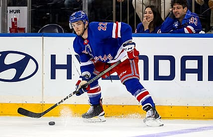 Jan 2, 2024; New York, New York, USA; New York Rangers center Jonny Brodzinski (22) looks to pass against the Carolina Hurricanes during the third period at Madison Square Garden. Mandatory Credit: Danny Wild-USA TODAY Sports