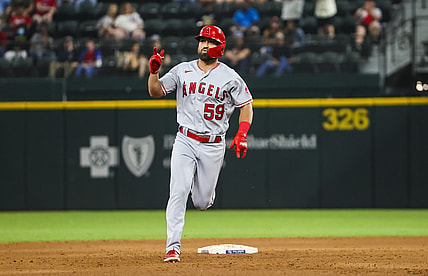 Aug 3, 2021; Arlington, Texas, USA; Los Angeles Angels third baseman Jack Mayfield (59) reacts after hitting a home run during the sixth inning against the Texas Rangers at Globe Life Field. Mandatory Credit: Kevin Jairaj-USA TODAY Sports