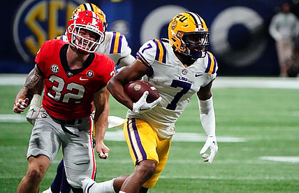Dec 3, 2022; Atlanta, GA, USA; LSU Tigers wide receiver Kayshon Boutte (7) carries the ball for a receiving touchdown against the Georgia Bulldogs during the first quarter of the SEC Championship game at Mercedes-Benz Stadium. Mandatory Credit: John David Mercer-USA TODAY Sports