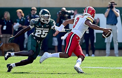Sep 23, 2023; East Lansing, Michigan, USA;  Michigan State Spartans defensive back Chance Rucker (25) chases Maryland Terrapins quarterback Taulia Tagovailoa (3) out of the pocket in the first quarter at Spartan Stadium. Mandatory Credit: Dale Young-USA TODAY Sports