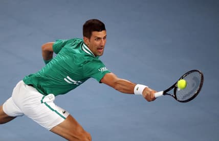 Tennis - Australian Open - Melbourne Park, Melbourne, Australia, February 16, 2021 Serbia's Novak Djokovic in action during his quarter final match against Germany's Alexander Zverev REUTERS/Asanka Brendon Ratnayake