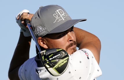 Feb 4, 2021; Scottsdale, Arizona, USA; Rickie Fowler plays his tee shot on the 15th hole during round one of the Waste Management Phoenix Open at TPC Scottsdale. Mandatory Credit: Rob Schumacher-USA TODAY NETWORK