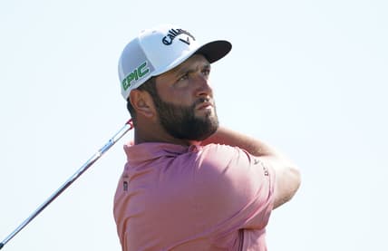 Jul 18, 2021; Sandwich, England, GBR; Jon Rahm plays his shot from the ninth tee during the final round of the Open Championship golf tournament. Mandatory Credit: Peter van den Berg-USA TODAY Sports