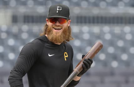 Jul 27, 2021; Pittsburgh, Pennsylvania, USA;  Pittsburgh Pirates left fielder Ben Gamel (18) reacts at the batting cage before a game against the Milwaukee Brewers at PNC Park. Mandatory Credit: Charles LeClaire-USA TODAY Sports