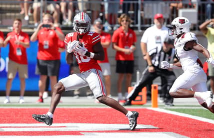 Sep 10, 2022; Columbus, Ohio, USA;  Ohio State Buckeyes wide receiver Marvin Harrison Jr. (18) makes the touchdown catch during the second quarter against the Arkansas State Red Wolves at Ohio Stadium. Mandatory Credit: Joseph Maiorana-USA TODAY Sports