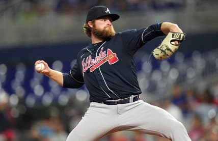 Oct 3, 2022; Miami, Florida, USA; Atlanta Braves starting pitcher Bryce Elder (55) delivers during the second inning against the Miami Marlins at loanDepot Park. Mandatory Credit: Jim Rassol-USA TODAY Sports
