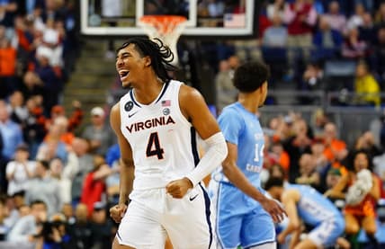 Mar 9, 2023; Greensboro, NC, USA; Virginia Cavaliers guard Armaan Franklin (4) reacts as he runs down the court against the North Carolina Tar Heels in the final seconds of the quarterfinals of the ACC tournament at Greensboro Coliseum. Mandatory Credit: John David Mercer-USA TODAY Sports