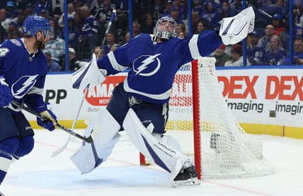 Dec 30, 2023; Tampa, Florida, USA; Tampa Bay Lightning goaltender Andrei Vasilevskiy (88) makes a save against the New York Rangers during the second period at Amalie Arena. Mandatory Credit: Kim Klement Neitzel-USA TODAY Sports