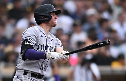 Aug 4, 2022; San Diego, California, USA; Colorado Rockies second baseman Ryan McMahon (24) watches his three-run home run against the San Diego Padres during the fifth inning at Petco Park. Mandatory Credit: Orlando Ramirez-USA TODAY Sports