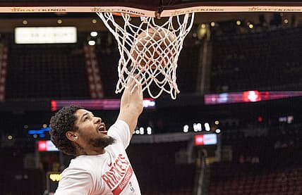 Mar 11, 2023; Houston, Texas, USA; Houston Rockets guard Daishen Nix (15) dunks during warms ups before playing against the Chicago Bulls at Toyota Center. Mandatory Credit: Thomas B. Shea-USA TODAY Sports