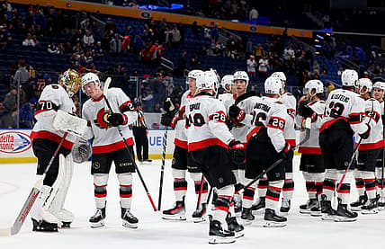Mar 27, 2024; Buffalo, New York, USA;  The Ottawa Senators celebrate a win over the Buffalo Sabres at KeyBank Center. Mandatory Credit: Timothy T. Ludwig-USA TODAY Sports