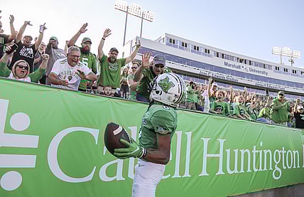 Oct 9, 2021; Huntington, West Virginia, USA; Marshall Thundering Herd wide receiver Shadeed Ahmed (0) celebrates with fans after catching a touchdown pass during the first overtime against the Old Dominion Monarchs at Joan C. Edwards Stadium. Mandatory Credit: Ben Queen-USA TODAY Sports