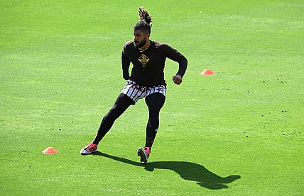 May 5, 2022; San Diego, California, USA; San Diego Padres shortstop Fernando Tatis Jr. (23) works out before the game against the Miami Marlins at Petco Park. Tatis Jr. is currently on the 60-day injured list. Mandatory Credit: Orlando Ramirez-USA TODAY Sports