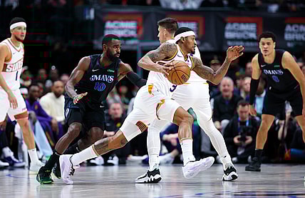 Jan 24, 2024; Dallas, Texas, USA;  Phoenix Suns guard Bradley Beal (3) controls the ball as Dallas Mavericks forward Tim Hardaway Jr. (10) defends during the first half at American Airlines Center. Mandatory Credit: Kevin Jairaj-USA TODAY Sports