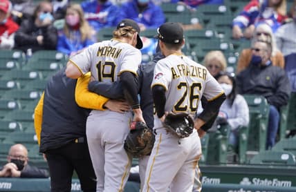 May 8, 2021; Chicago, Illinois, USA; Pittsburgh Pirates first baseman Colin Moran (19) leaves the game after being hurt on a play at first base against the Chicago Cubs during the first inning at Wrigley Field. Mandatory Credit: David Banks-USA TODAY Sports