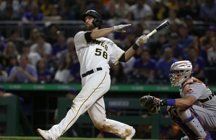 Jul 17, 2021; Pittsburgh, Pennsylvania, USA;  Pittsburgh Pirates catcher Jacob Stallings (58) hits a game winning grand slam home run to defeat the New York Mets during the ninth inning at PNC Park. Pittsburgh won 9-7. Mandatory Credit: Charles LeClaire-USA TODAY Sports