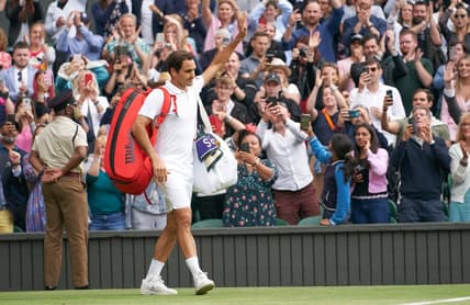 Jul 7, 2021; London, United Kingdom; Roger Federer (SUI) waving farewell to the Centre Court fans after losing to Hubert Hurkacz (POL) in the quarter finals at All England Lawn Tennis and Croquet Club. Mandatory Credit: Peter van den Berg-USA TODAY Sports