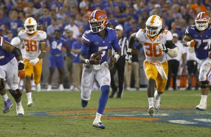 Sep 25, 2021; Gainesville, Florida, USA; Florida Gators quarterback Emory Jones (5) runs with the ball against the Tennessee Volunteers during the third quarter at Ben Hill Griffin Stadium. Mandatory Credit: Kim Klement-USA TODAY Sports