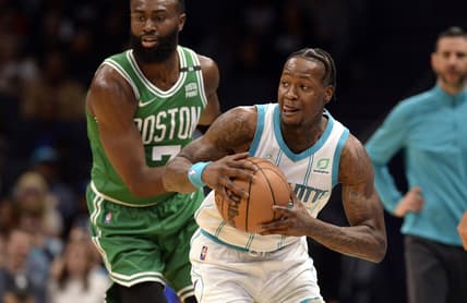 Mar 9, 2022; Charlotte, North Carolina, USA;  Charlotte Hornets guard Terry Rozier (3) looks to pass during the first half against the Boston Celtics at the Spectrum Center. Mandatory Credit: Sam Sharpe-USA TODAY Sports