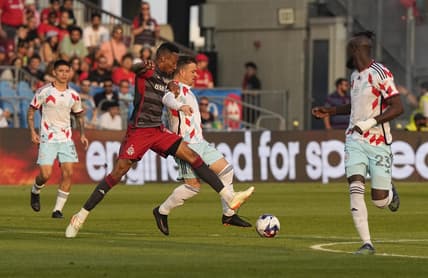May 31, 2023; Toronto, Ontario, CAN; Toronto FC midfielder Mark-Anthony Kaye (14) chases the ball with Chicago Fire midfielder Xherdan Shaqiri (10) at BMO Field. Mandatory Credit: John E. Sokolowski-USA TODAY Sports