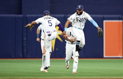 Jun 6, 2023; St. Petersburg, Florida, USA;  Tampa Bay Rays center fielder Manuel Margot (13) and shortstop Wander Franco (5) celebrate as they beat the Minnesota Twins at Tropicana Field. Mandatory Credit: Kim Klement-USA TODAY Sports