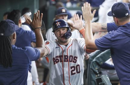 Jul 29, 2023; Houston, Texas, USA; Houston Astros designated hitter Chas McCormick (20) is congratulated after scoring during the fifth inning against the Tampa Bay Rays at Minute Maid Park. Mandatory Credit: Troy Taormina-USA TODAY Sports