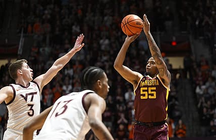 Nov 28, 2022; Blacksburg, Virginia, USA; Minnesota Golden Gophers guard Ta'lon Cooper (55) shoots over Virginia Tech Hokies guard Sean Pedulla (3) in the first half at Cassell Coliseum. Mandatory Credit: Lee Luther Jr.-USA TODAY Sports