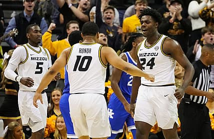 Dec 28, 2022; Columbia, Missouri, USA; Kentucky Wildcats forward Chris Livingston (24) celebrates after scoring with guard Nick Honor (10) and guard D'Moi Hodge (5) during the first half against the Kentucky Wildcats at Mizzou Arena. Mandatory Credit: Jay Biggerstaff-USA TODAY Sports