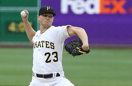 May 29, 2021; Pittsburgh, Pennsylvania, USA;  Pittsburgh Pirates starting pitcher Mitch Keller (23) delivers a pitch against the Colorado Rockies during the first inning at PNC Park. Mandatory Credit: Charles LeClaire-USA TODAY Sports