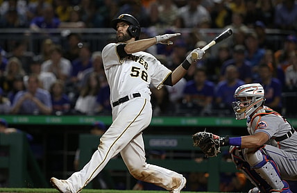 Jul 17, 2021; Pittsburgh, Pennsylvania, USA;  Pittsburgh Pirates catcher Jacob Stallings (58) hits a game winning grand slam home run to defeat the New York Mets during the ninth inning at PNC Park. Pittsburgh won 9-7. Mandatory Credit: Charles LeClaire-USA TODAY Sports