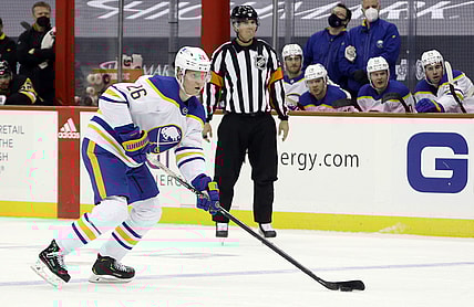 May 6, 2021; Pittsburgh, Pennsylvania, USA;  Buffalo Sabres defenseman Rasmus Dahlin (26) handles the puck against the Pittsburgh Penguins during the second period at PPG Paints Arena. Mandatory Credit: Charles LeClaire-USA TODAY Sports
