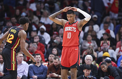 Dec 20, 2023; Houston, Texas, USA; Houston Rockets forward Jabari Smith Jr. (10) reacts after a play during the second quarter against the Atlanta Hawks at Toyota Center. Mandatory Credit: Troy Taormina-USA TODAY Sports