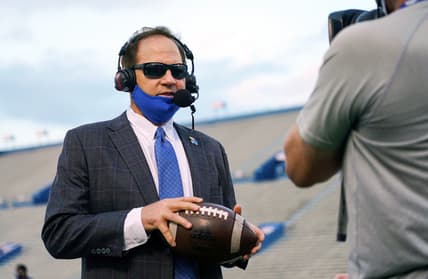 Sep 12, 2020; Lawrence, Kansas, USA; Kansas Jayhawks head coach Les Miles is interviewed before a game against the Coastal Carolina Chanticleers at David Booth Kansas Memorial Stadium. Mandatory Credit: Jay Biggerstaff-USA TODAY Sports