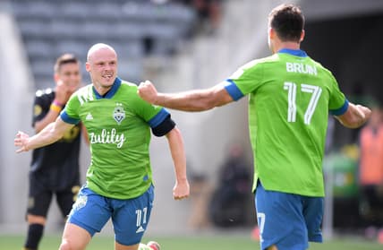 Apr 24, 2021; Los Angeles, CA, Los Angeles, CA, USA; Seattle Sounders defender Brad Smith (11) reacts after scoring a goal against the Los Angeles FC during the second half at Banc of California Stadium. Mandatory Credit: Orlando Ramirez-USA TODAY Sports