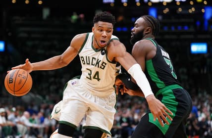 May 1, 2022; Boston, Massachusetts, USA; Milwaukee Bucks forward Giannis Antetokounmpo (34) drives the ball against Boston Celtics guard Jaylen Brown (7) in the second half during game one of the second round for the 2022 NBA playoffs at TD Garden. Mandatory Credit: David Butler II-USA TODAY Sports