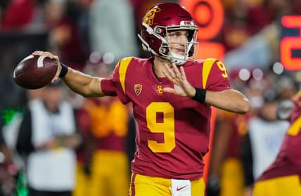 Oct 9, 2021; Los Angeles, California, USA; USC Trojans quarterback Kedon Slovis (9) throws a pass during the third quarter against the Utah Utes at United Airlines Field at Los Angeles Memorial Coliseum. Mandatory Credit: Robert Hanashiro-USA TODAY Sports