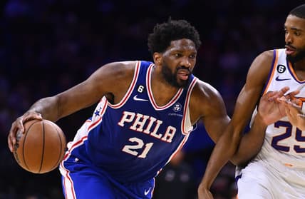 Nov 7, 2022; Philadelphia, Pennsylvania, USA; Philadelphia 76ers center Joel Embiid (21) drives against Phoenix Suns forward Mikal Bridges (25) in the second quarter at Wells Fargo Center. Mandatory Credit: Kyle Ross-USA TODAY Sports