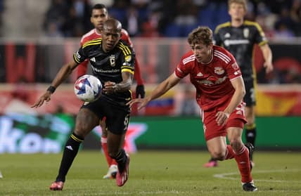 Mar 18, 2023; Harrison, New Jersey, USA; New York Red Bulls midfielder Daniel Edelman (75) fights for the the ball against New York Red Bulls defender Kyle Duncan (6) at Red Bull Arena. Mandatory Credit: Vincent Carchietta-USA TODAY Sports