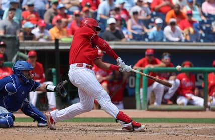 Mar 28, 2023; Clearwater, Florida, USA;  Philadelphia Phillies first baseman Darick Hall (24) singles during the fourth inning against the Toronto Blue Jays at BayCare Ballpark. Mandatory Credit: Kim Klement-USA TODAY Sports